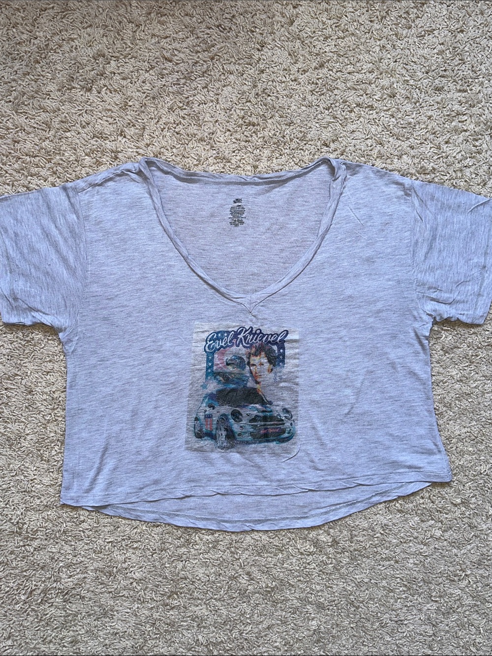 Light Gray V-Neck Graphic Tee with Evel Knievel Sticker